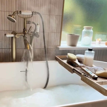 Buy Downton floorstanding bath shower mixer tap with white ceramic levers - antique brass Online UK | HOUSE OF ENKI