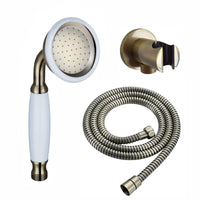 Buy Traditional Brass & White Ceramic Hand Shower Kit Incl. Hose And Wall Bracket With Outlet - Antique Brass Online UK | HOUSE OF ENKI