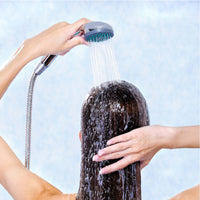 Cruze manual shower mixer with handset, hose and wall bracket - Showers