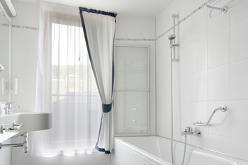 how much to install shower over bath uk