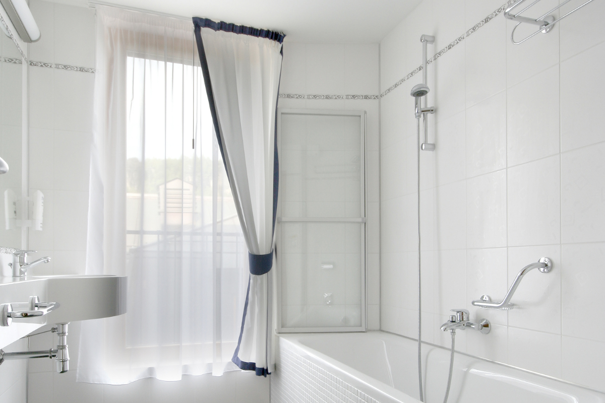 how much to install shower over bath uk