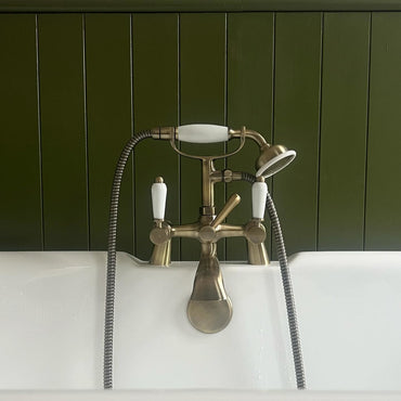 Downton bath shower mixer tap with white ceramic levers - antique bronze
