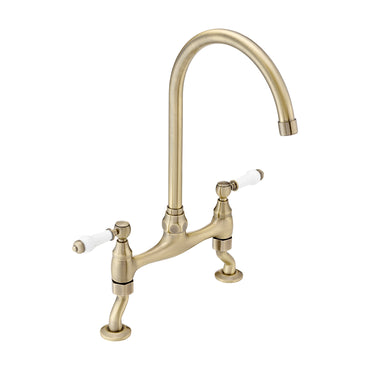 Astbury traditional bridge kitchen mixer tap with white ceramic levers deck mounted - antique brass