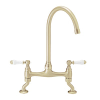 Astbury traditional bridge kitchen mixer tap with white ceramic levers deck mounted - brushed brass
