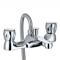 Close-up of a chrome bath shower mixer tap with dual handles, a flexible hose connection, and a sleek modern design