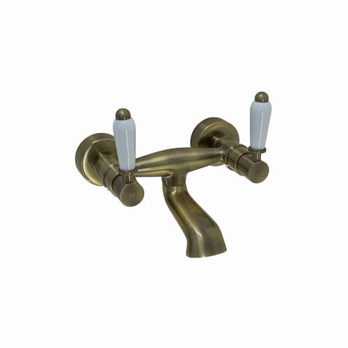Buy Downton wall mounted bath mixer tap with white ceramic levers - antique brass online UK
